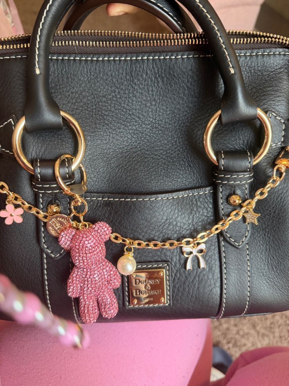 Dooney & Bourke Black Pebbled Leather Satchel with Pink Rhinestone Bear Charm
